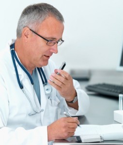 doctor making notes